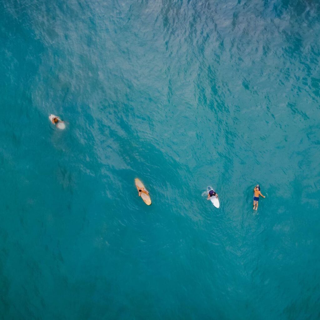 Paddlers waiting for the surf