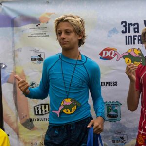 Boy winning a surf competition